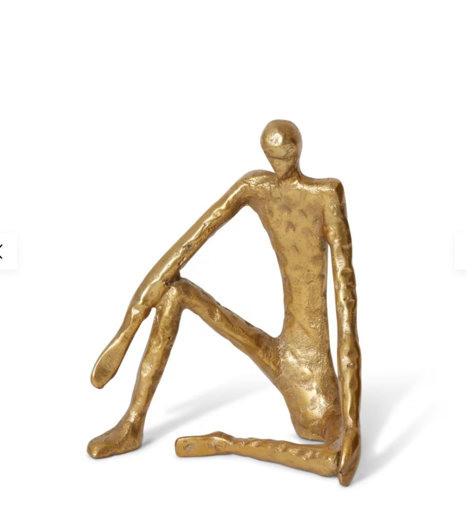 Sculpture figure seated